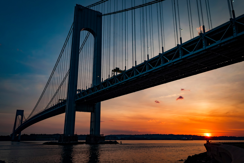 The bridge connecting Brooklyn to Staten Island named Verrazano bridge seen at dusk